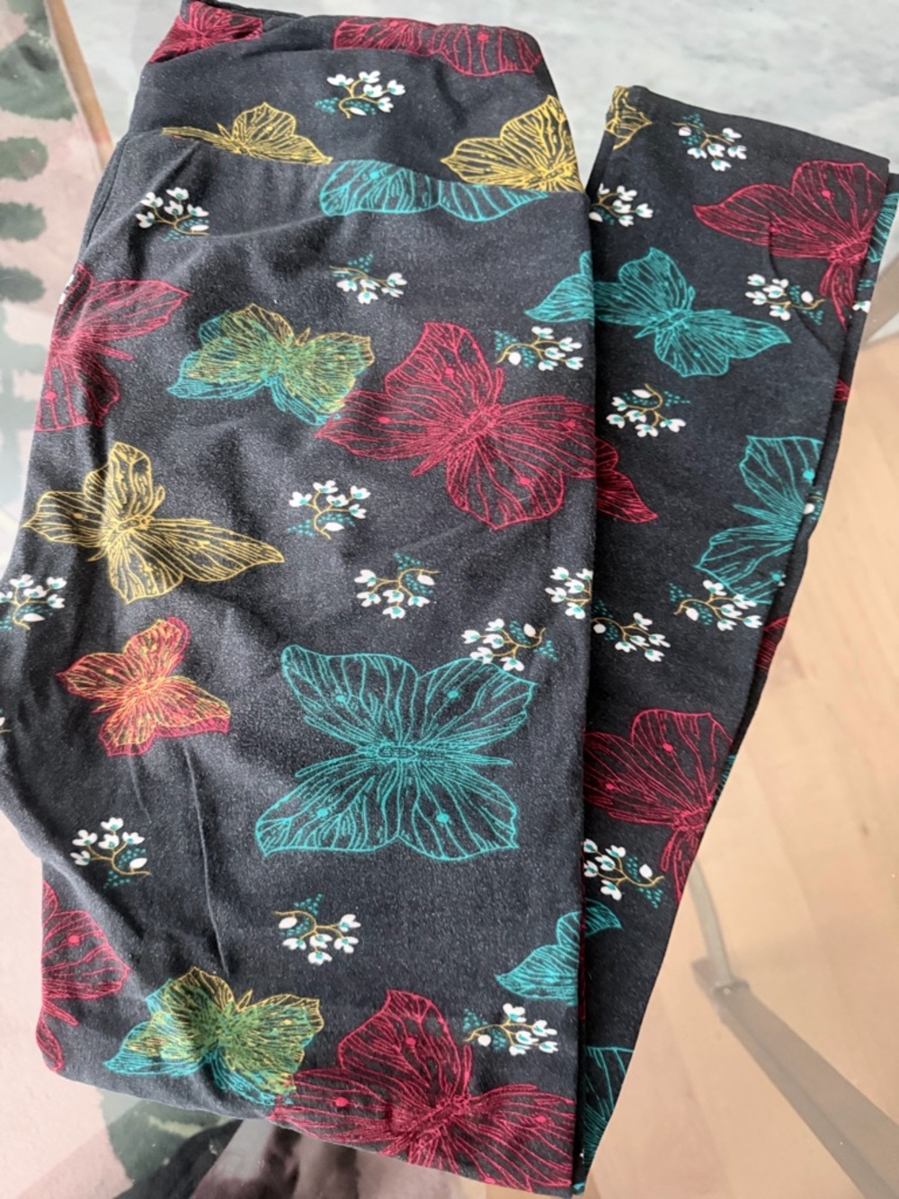LuLaRoe Black Leggings with Teal, Red and Yellow Butterfly Print